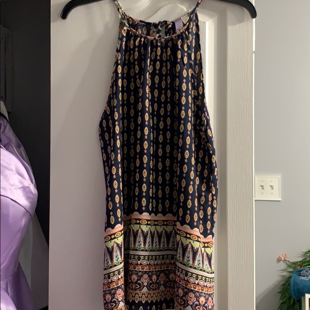 A cute sleeveless patterned shirt